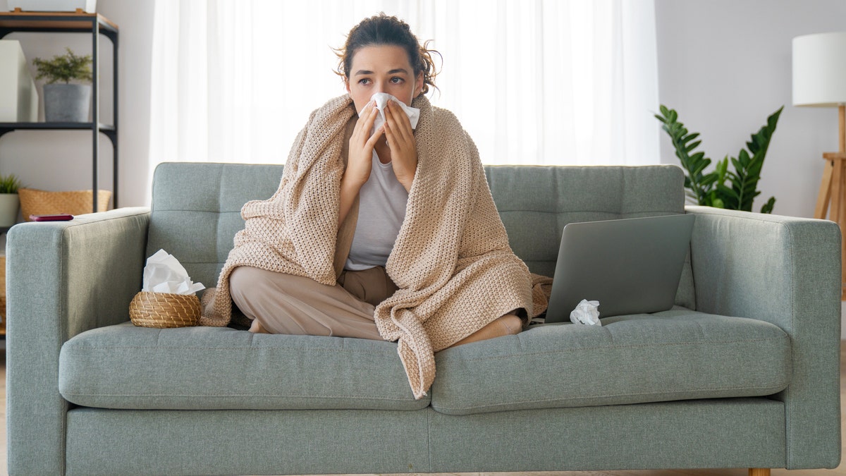 A sick person on the couch